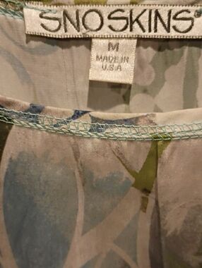 SnoSkins Printed Lightweight White Top in a Blue and Olive Patterned Design